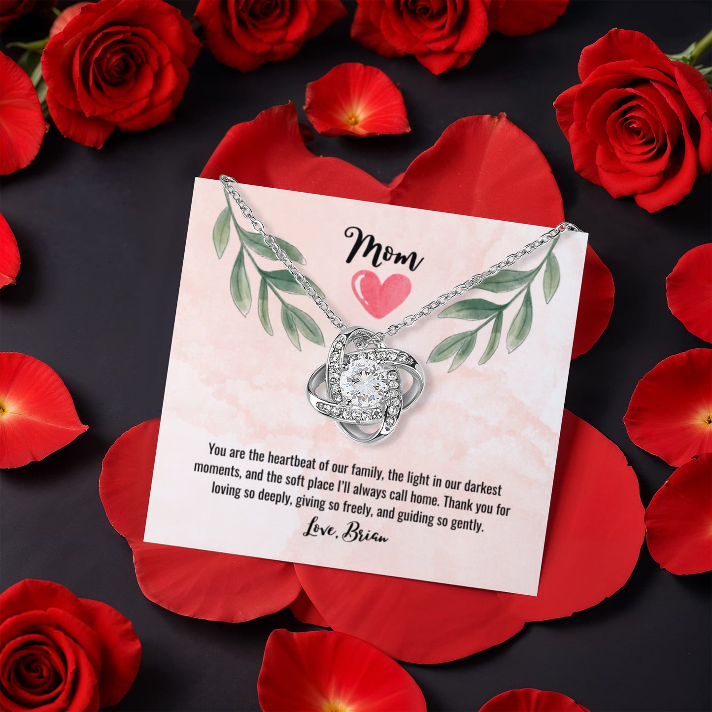 Love Knot Necklace in rotating box with a rose on the opposite side - RRM08
