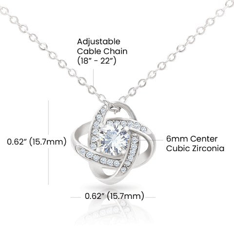 Love Knot Necklace in rotating box with a rose on the opposite side - RRM08
